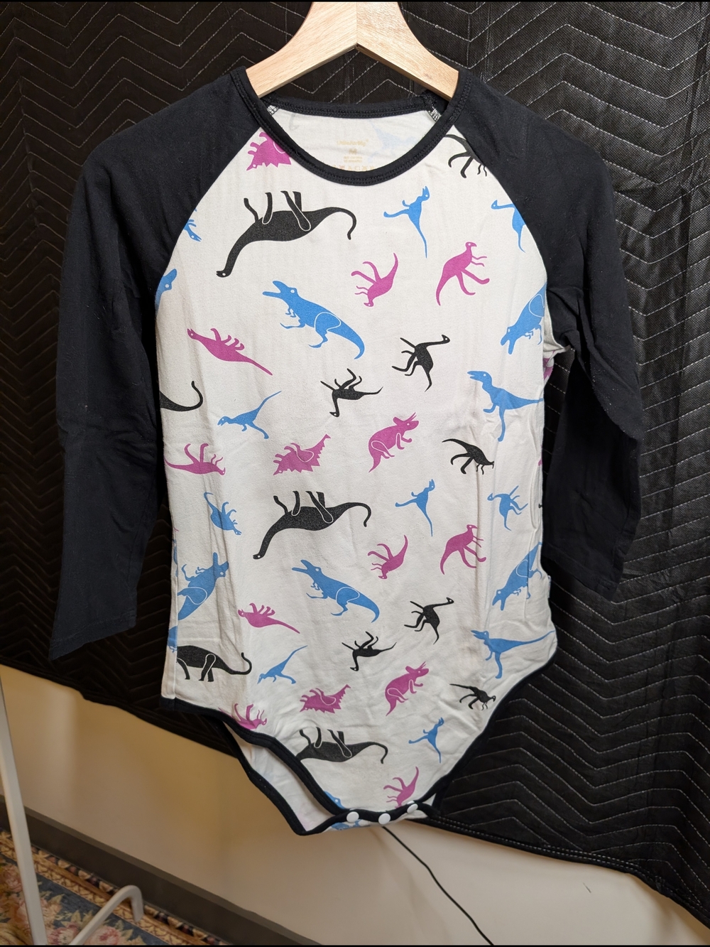 White Bodysuit with Black Trim and Pink & Blue Dino Prints